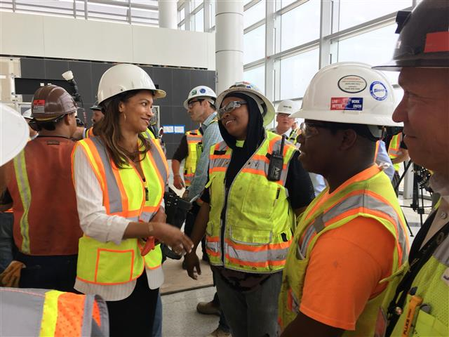 Women wearing hardhats