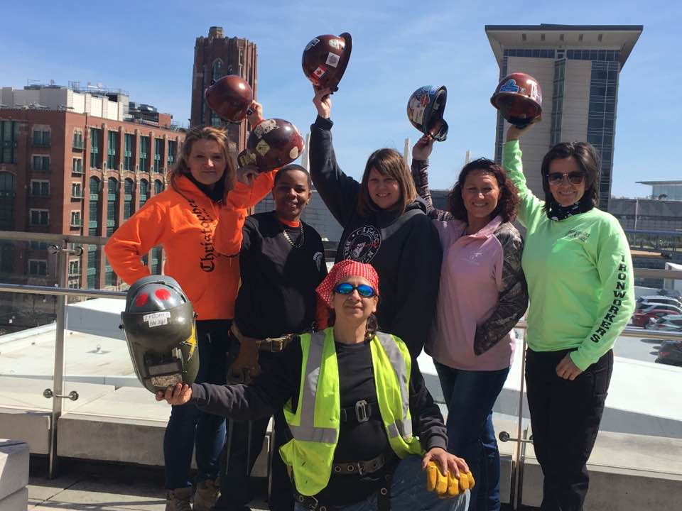 Women wearing hardhats