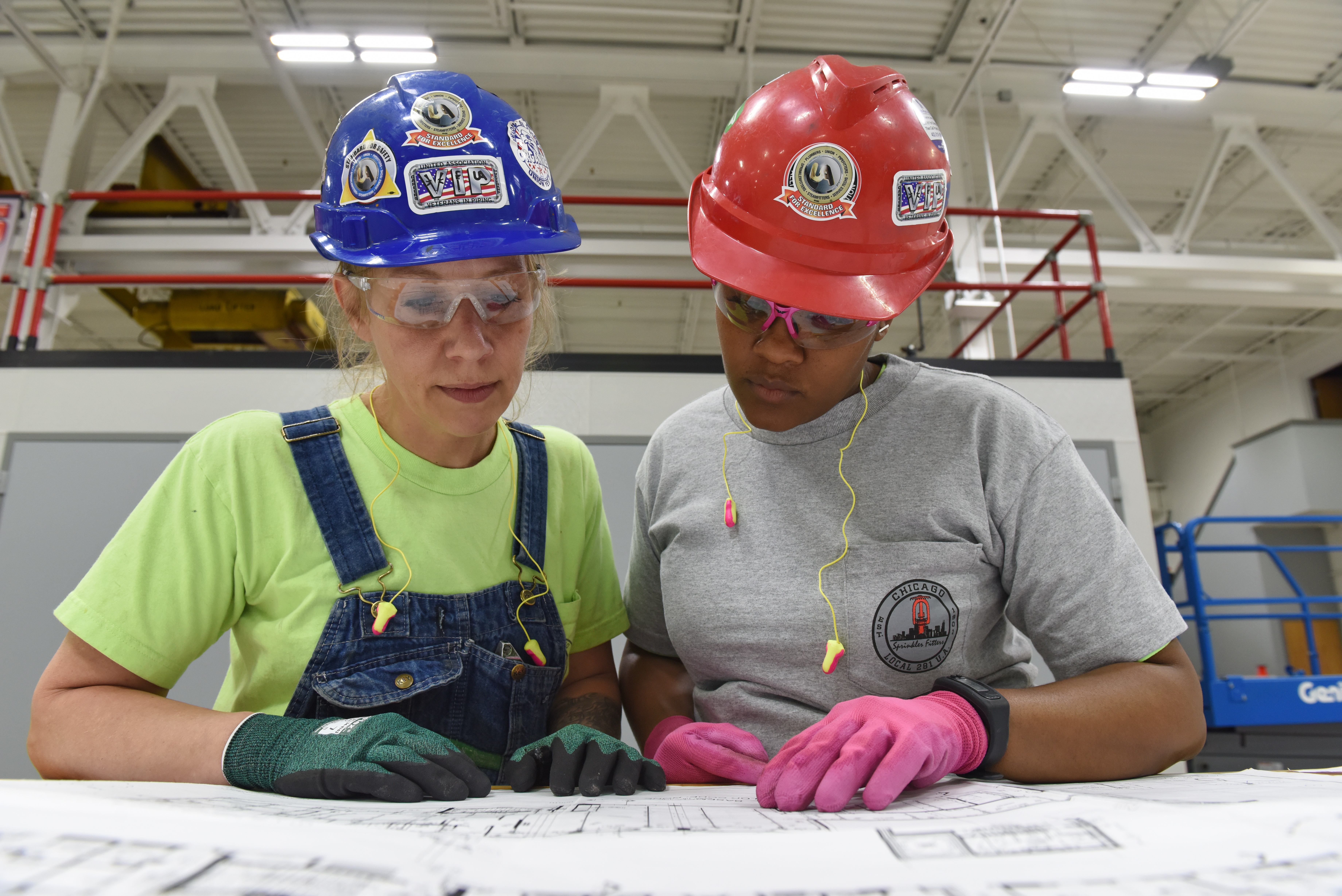 Women wearing hardhats