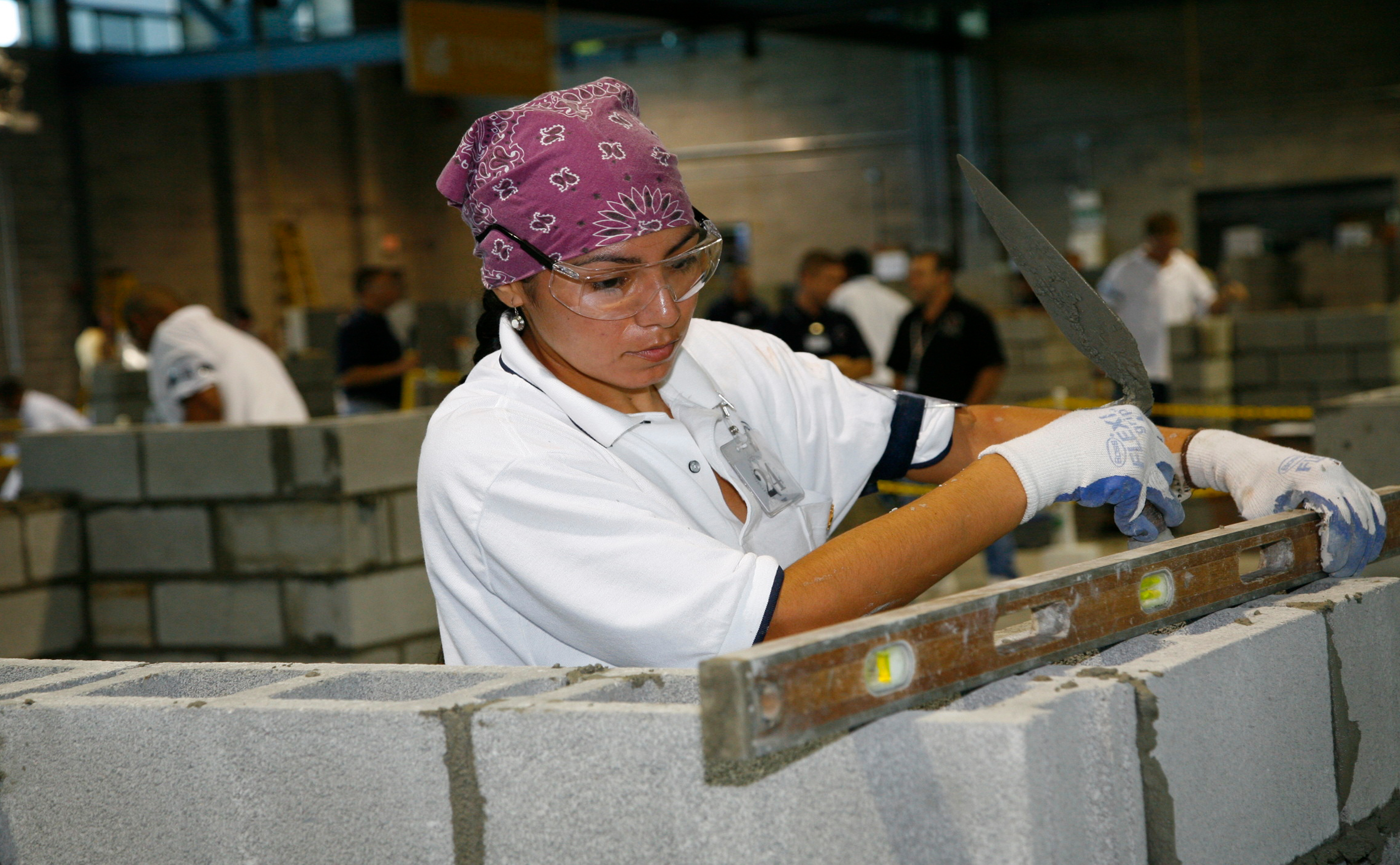 Woman building a wall