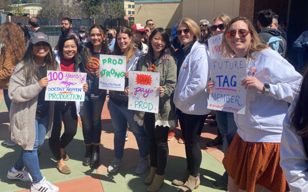 Production workers at a rally.